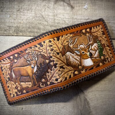 Outdoorsman hand tooled and laced deer wallet