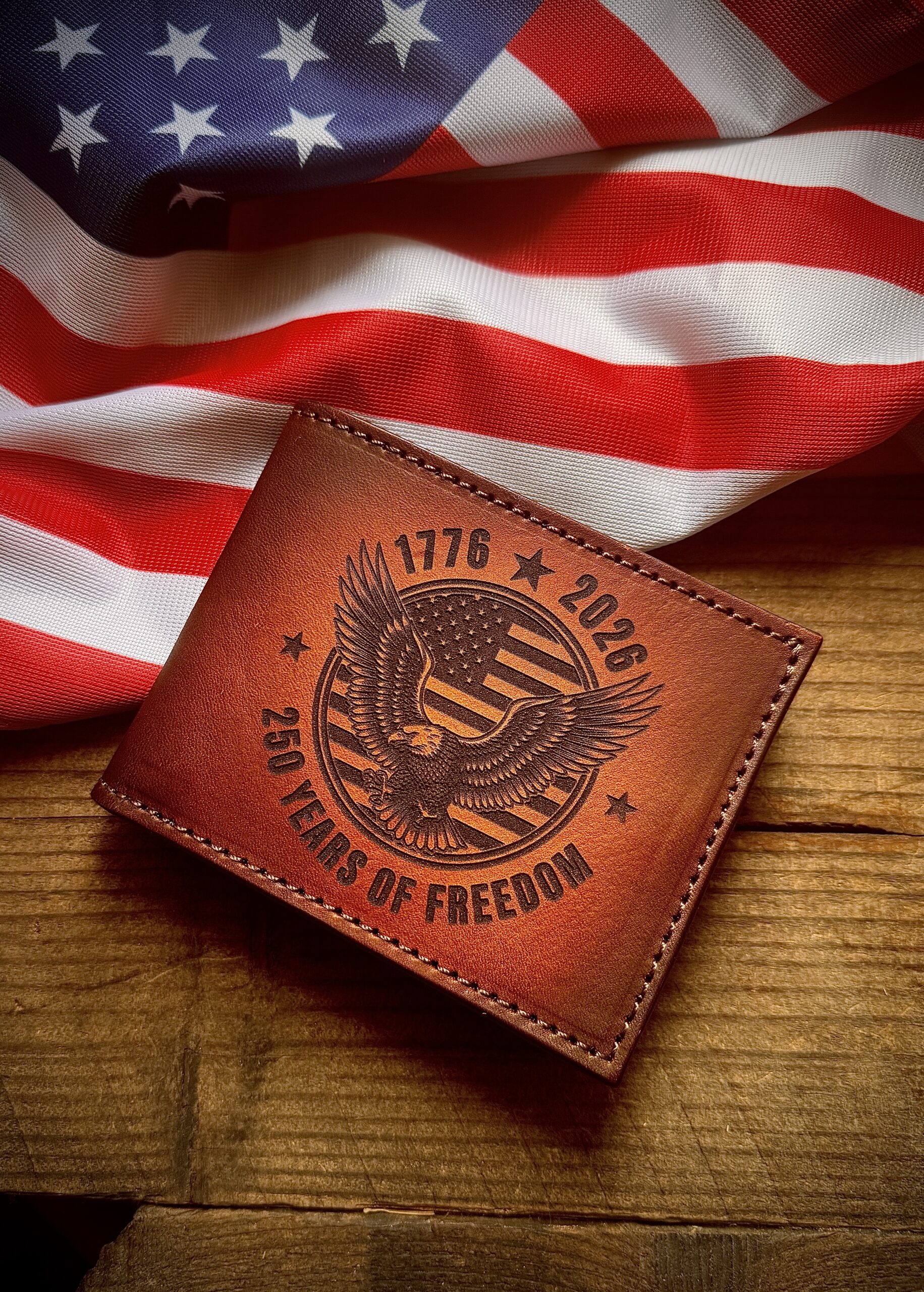Celebrate 250 Years of Freedom! Premium leather bifold wallet laser engraved with a powerful American eagle & flag design. 1776-2026 commemorative edition. Patriotic gift for veterans & proud Americans. 🇺🇸