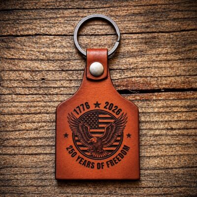 Handcrafted patriotic leather keychain featuring an eagle, American flag, 1776 and 2026, and 250 Years of Freedom