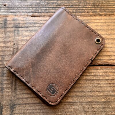Brown minimalist compact oil tanned leather credit card wallet. Clearance discount item