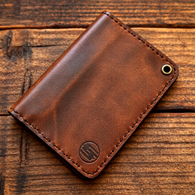 Brown minimalist compact oil tanned leather credit card wallet. Clearance discount item